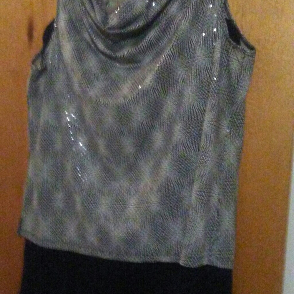 2 piece top and pleaded bottom.
